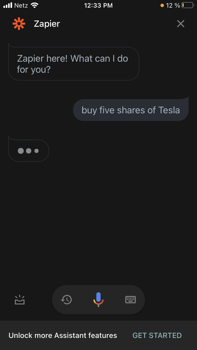 sharing the phrase "buy five shares of Tesla" with Zapier